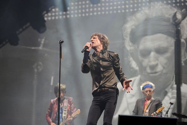 Keith Richards watches over Mick Jagger at Glastonbury yesterday